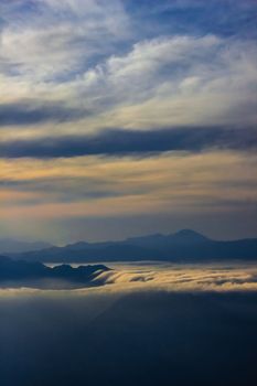 Breathtaking view of mountains and clouds at sunset over Pinal de Amoles, Mexico.