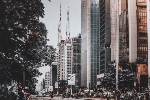 Dynamic urban scene capturing skyscrapers and bustling city life in Campinas, Brazil.