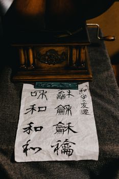Authentic Japanese calligraphy with traditional writing tools in Kawagoe, Japan.