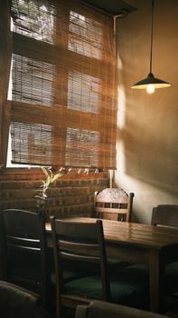 Inviting rustic cafe interior featuring natural wood elements and soft lighting.